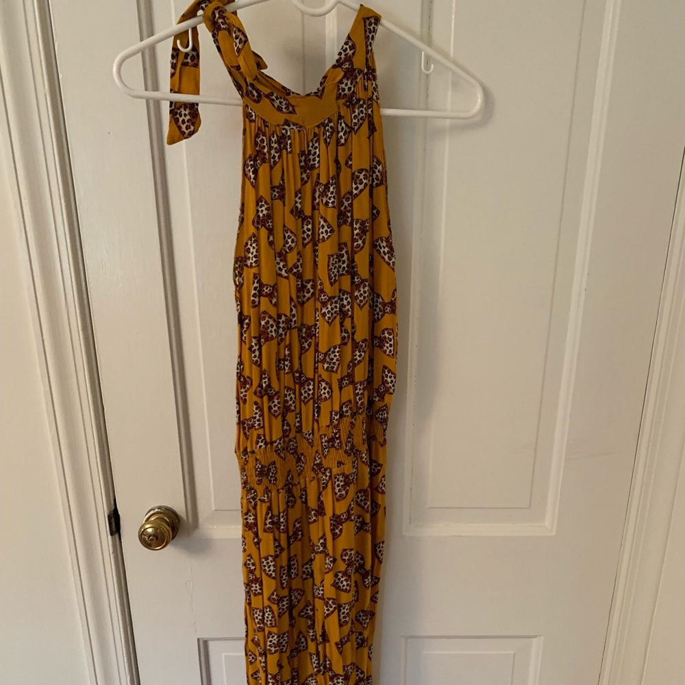 Yellow jumpsuit with leopard print bow ties